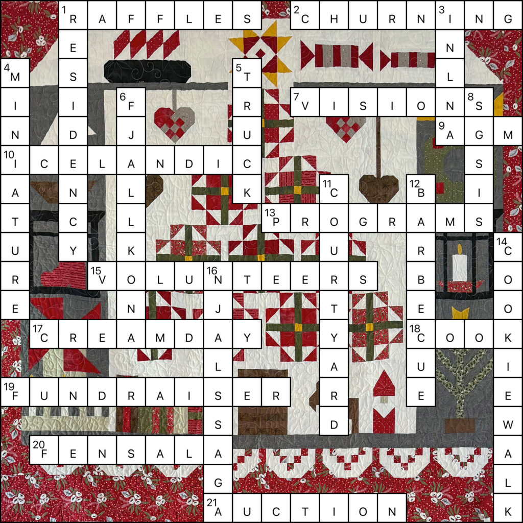 A completed crossword puzzle on a quilted, farm-themed background, featuring a barn, tractor, and windmill. Words like “TRUCK,” “VISION,” and “FUNDRAISER” highlight this vibrant Year in Review of games amid colorful patchwork patterns.